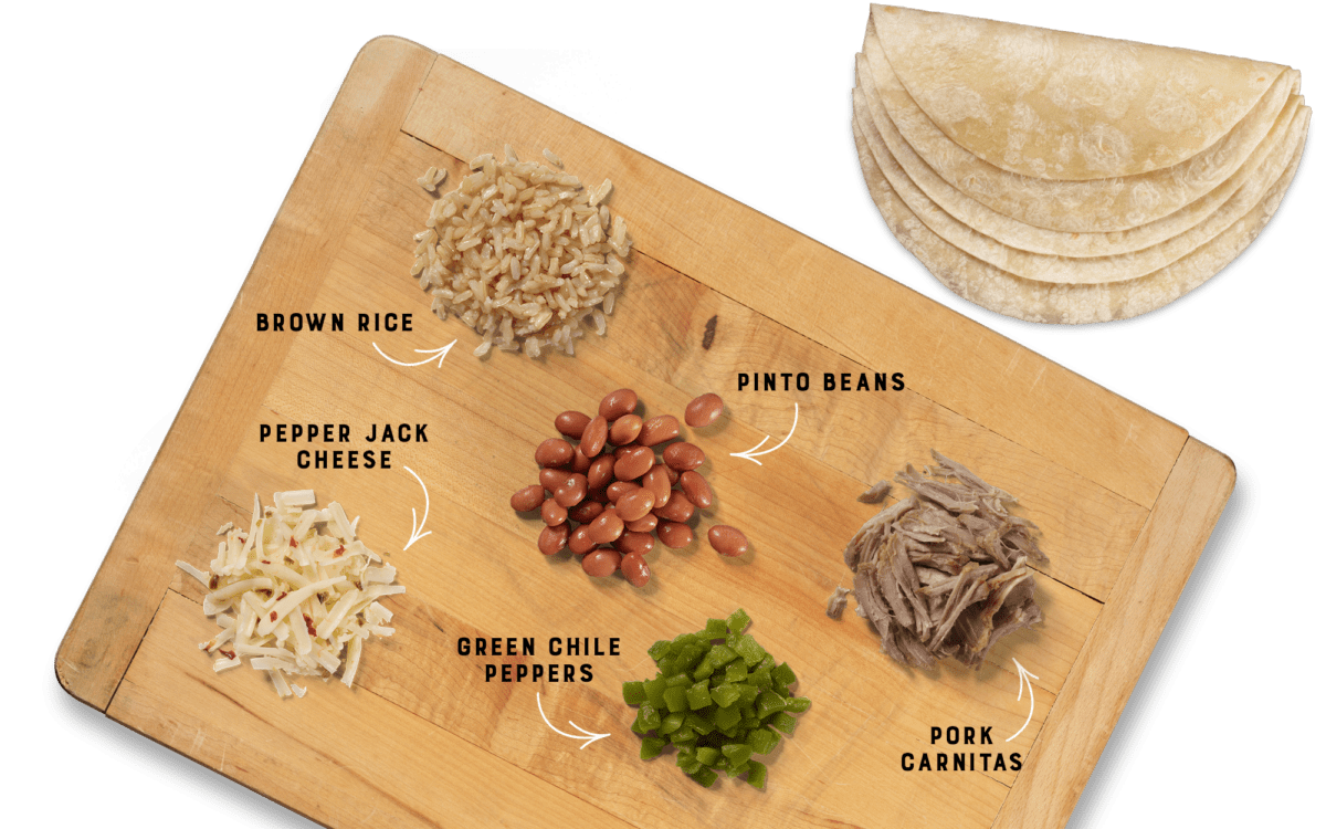 Pork Carnitas Burrito ingredients on Cutting Board